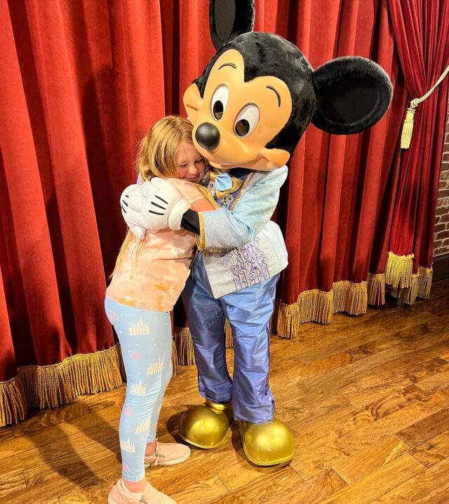 Ella Joyce with Mickey Mouse