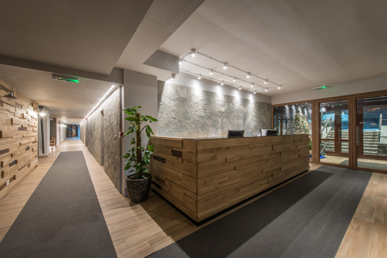 Reception desk and view on hallway in modern hotel