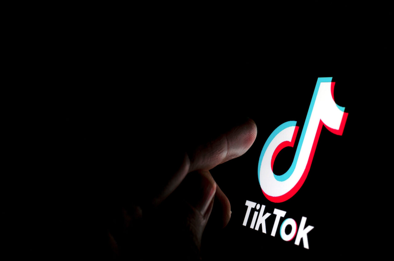 Stone / UK - July 28 2019: TikTok app logo on the screen and a f