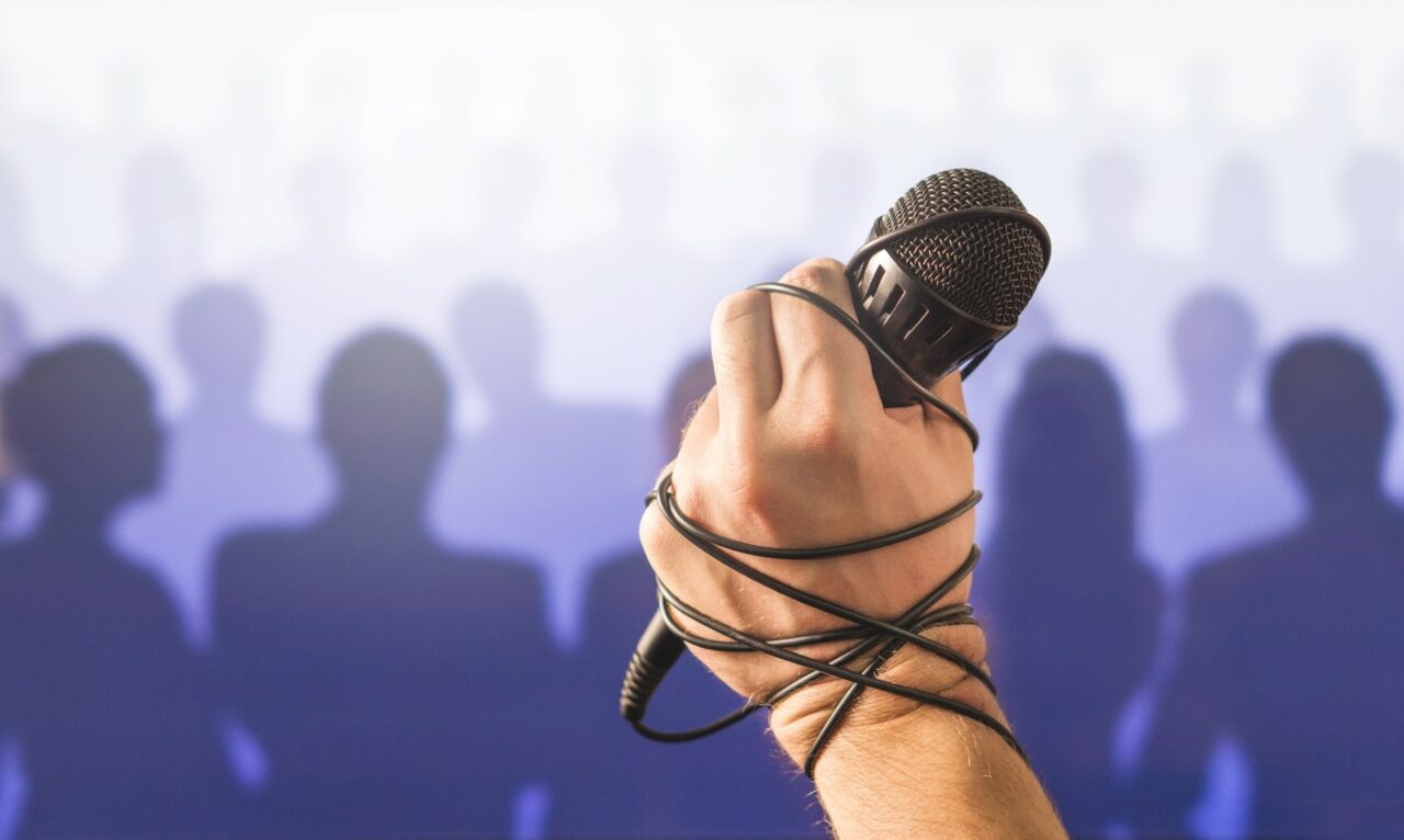 Stage fright in public speaking or bad karaoke singing live in f