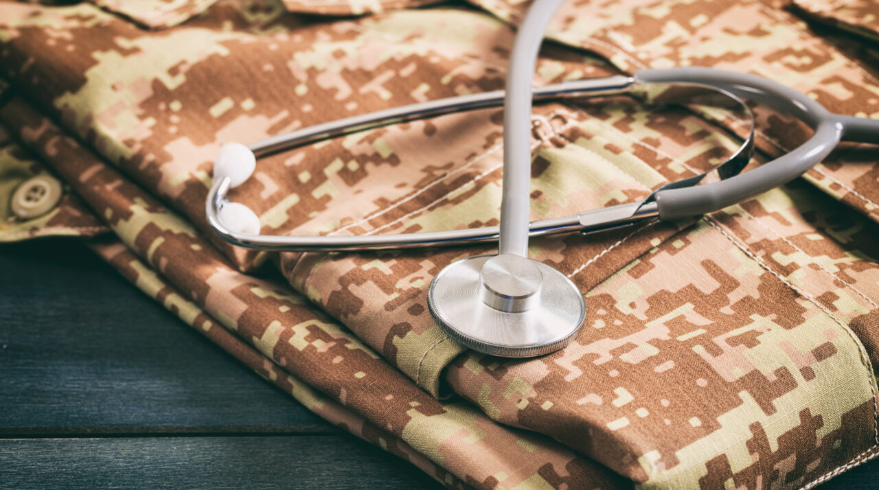 USA army health care. Military digital pattern uniform and medic