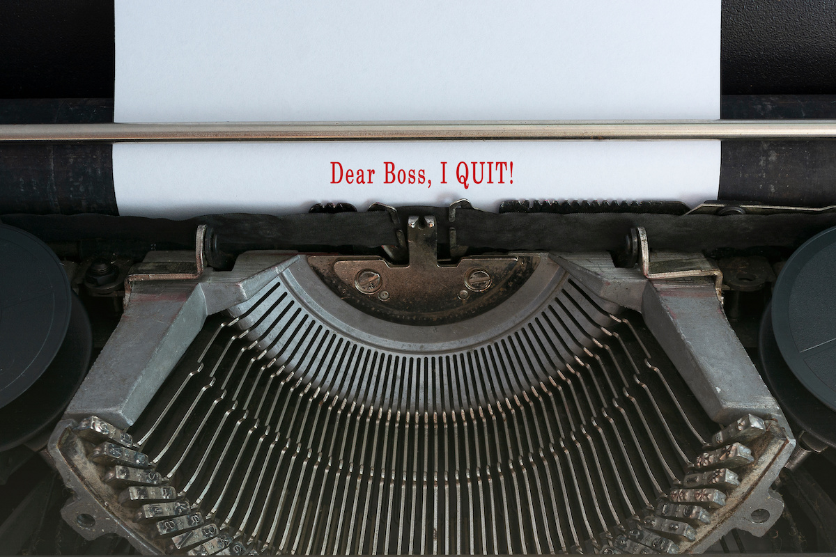 Text typed on an old classic typewriter - Dear boss, I quit. Great Resignation, Resign