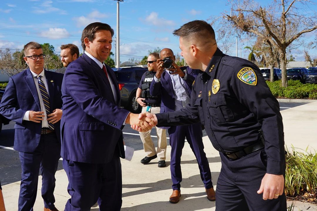 Florida Gov. Ron DeSantis hand delivers 1,000 bonus to first