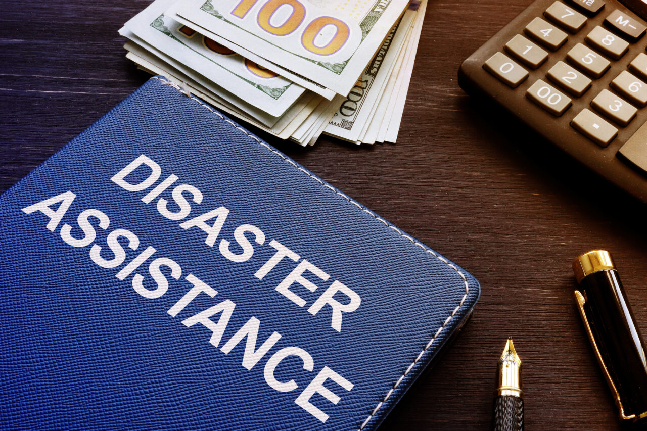 Disaster assistance is shown on the conceptual business photo