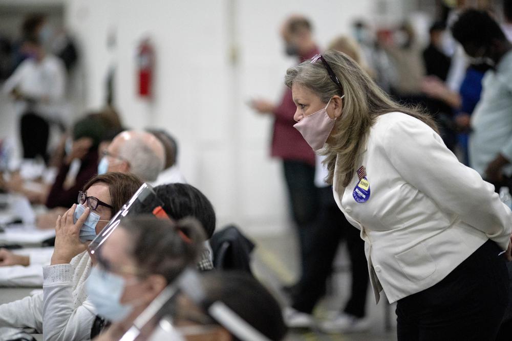 Election officials brace for confrontational poll watchers