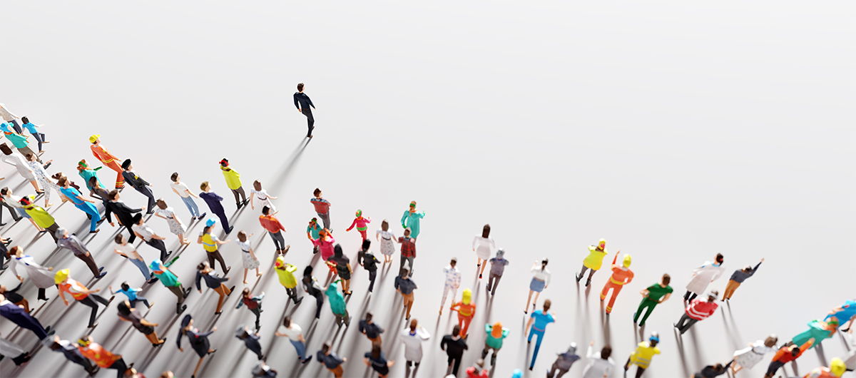 Businessman leader leading a large group of people.