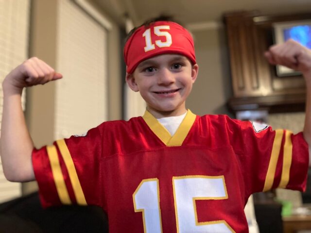 Mason Gossett, nephew of Rep. Peggy Gossett-Seidman, shows off his spirit for the Chiefs, anticipating the big game.