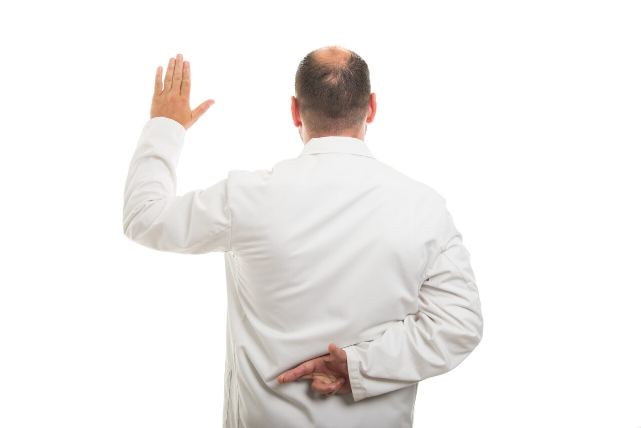 Back view of male doctor showing fake oath gesture