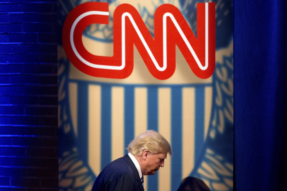 trump, donald - in front of cnn logo