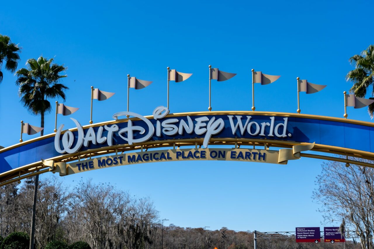 Orlando, Florida, USA - February 9, 2022:  A Walt Disney World entrance arch gate in Orlando, Florida, USA. Walt Disney World is an entertainment resort complex.