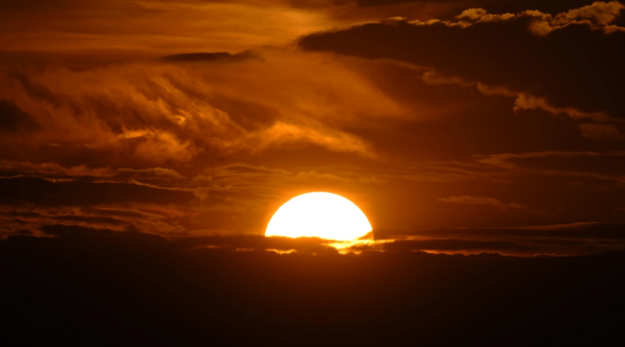 Setting sun over Rocky Mountains AP