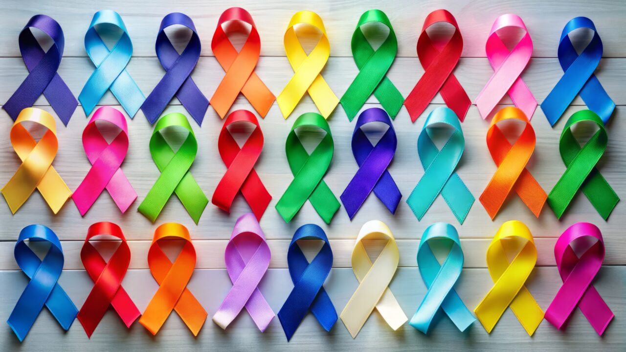 Colorful ribbons and iconic symbols unite to provide mental health support for suicide prevention, offering hope and