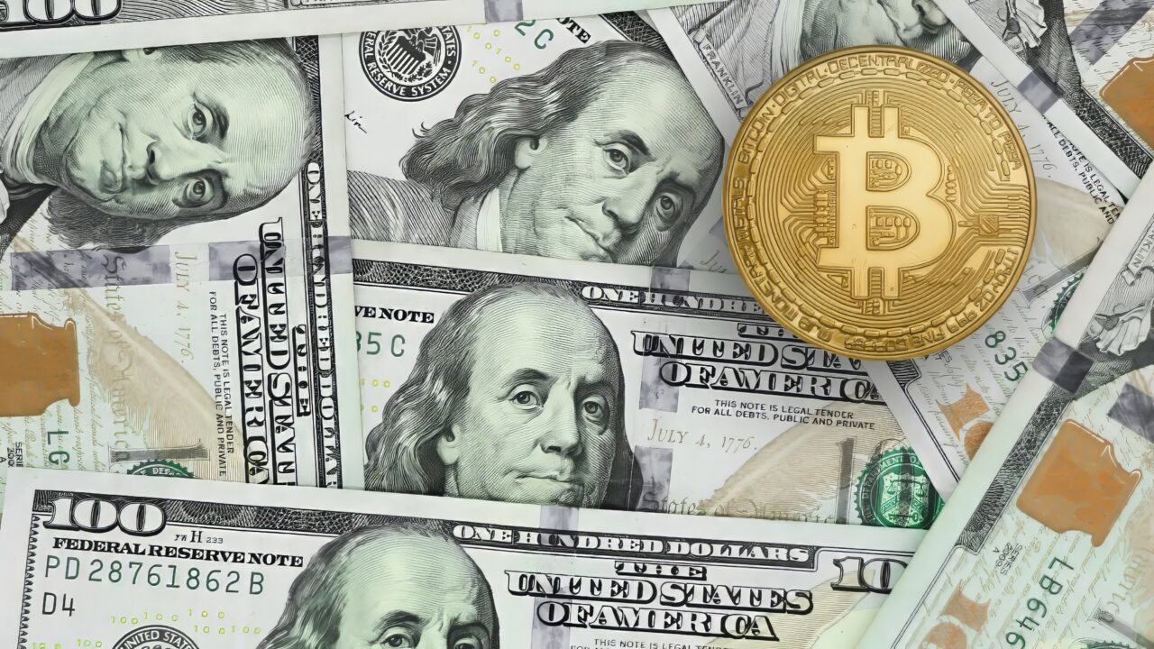 Bitcoin illustration on 100 dollar bills, horizontal