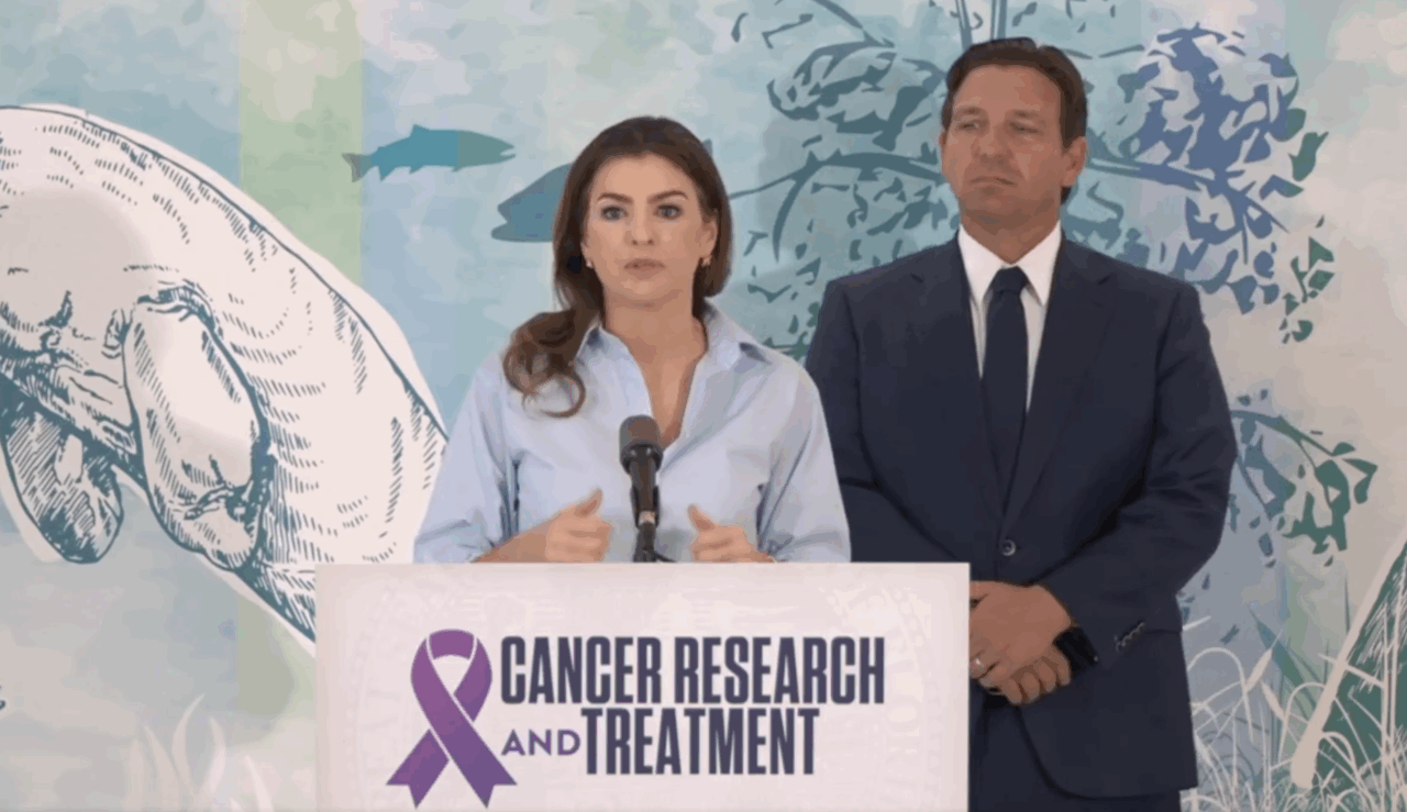 First Lady Casey DeSantis and Gov. Ron DeSantis speak about cancer funding at July 23 press conference. (Florida Channel)